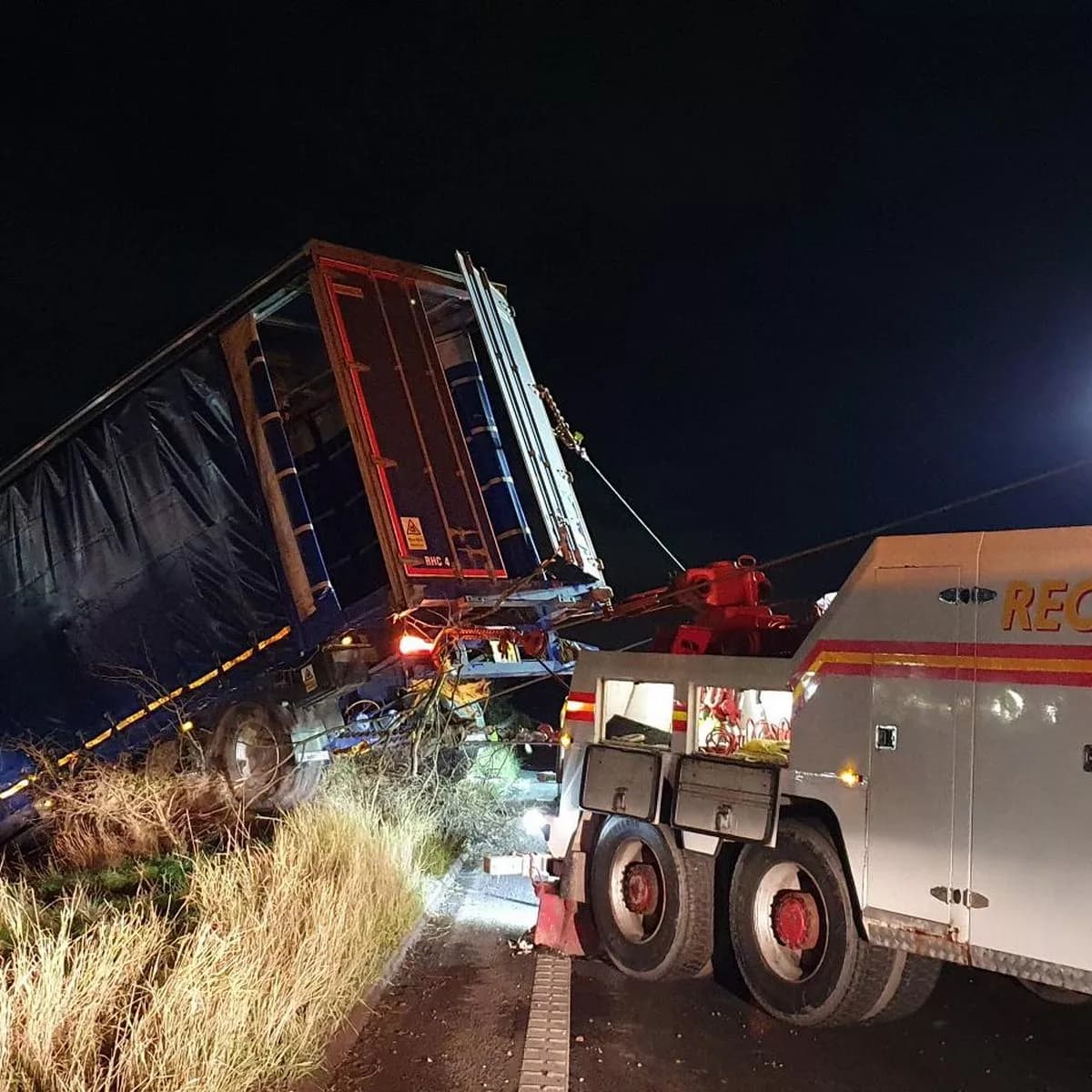 Recovery crew clearing a heavy goods vehicle collision